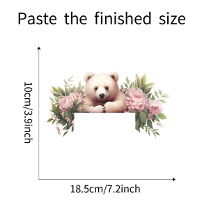 Détail d'un sticker mural ours et fleurs roses avec dimensions de 18,5x10cm
