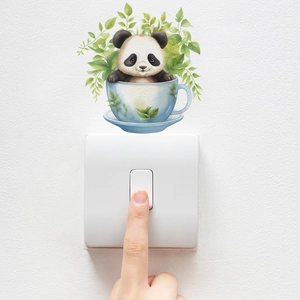 Detail of red panda in blue teacup wall sticker applied above a white home light switch