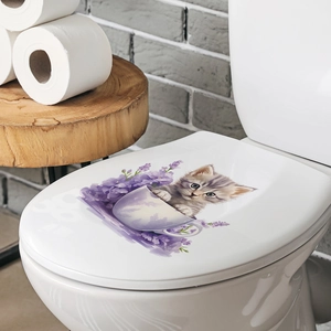 Detail of cute cat and lavender flower sticker applied on white toilet lid