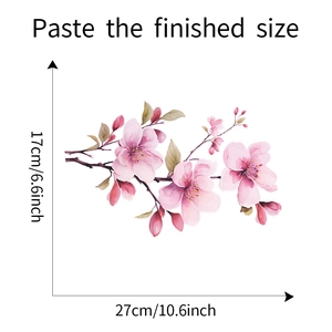 Detailed view of pink plum blossom wall sticker with dimensions showing 17cm by 27cm size