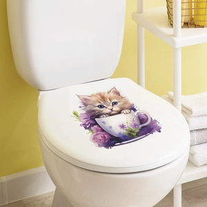 Cartoon kitten in purple floral teacup decal on a white toilet lid for bathroom decor
