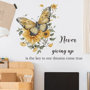 Detail of sunflower and butterfly wall stickers with inspirational quotes on office wall
