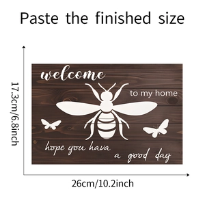 Detailed dimension guide for bee welcome wall sticker showing 26cm width and 17.3cm height