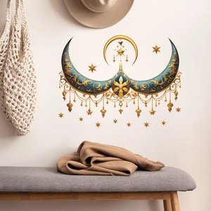 Bohemian crescent moon wall decal with golden tassels and stars in a cozy home setting