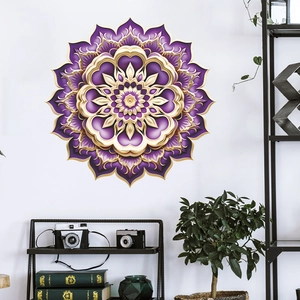 Detailed close-up of purple and gold mandala wall sticker on a white bedroom wall