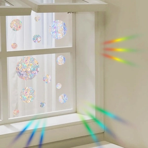 Rainbow circle window film with prism texture creating colorful light shadows on the wall