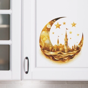 Close-up of golden Eid moon and castle wall stickers on a minimalist white cabinet door
