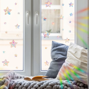 Holographic star window stickers with rainbow light effects for cozy home decor