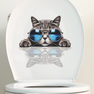3D realistic cat sticker with blue sunglasses on white toilet lid for bathroom decor