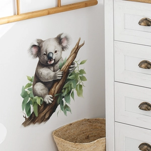 Detailed wall sticker showing a cute koala on a branch for nursery room decoration