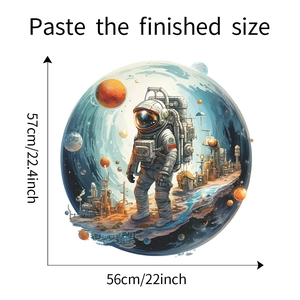 Detailed view of astronaut space theme wall sticker showing dimensions 56cm x 57cm