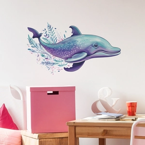 Detail of colorful whale wall sticker applied on bedroom wall near wooden desk
