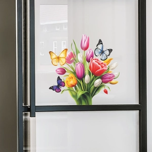 Detail of colorful butterfly and tulip stickers applied on glass window surface