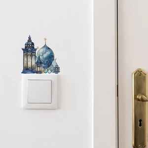 Close-up of blue watercolor lantern wall sticker for light switch in a living room
