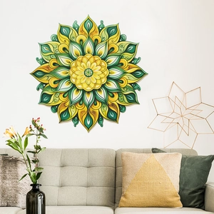 Detailed view of a green mandala wall sticker above a gray sofa in a modern living room
