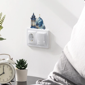Blue watercolor Islamic lantern wall sticker with stars and moon above a light switch