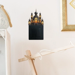 Dettaglio adesivo murale castello islamico grigio sopra un interruttore nero