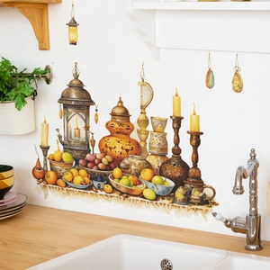 Detailed wall sticker featuring vintage lanterns, candles, and fruits on a kitchen wall