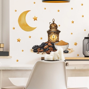 Detail of Ramadan wall stickers featuring golden moon stars lantern and food motif
