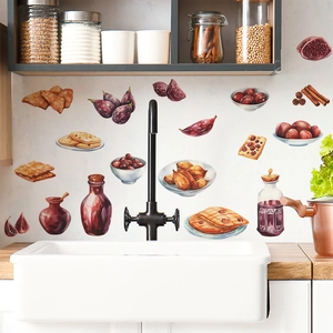 Detail of DIY kitchen wall stickers with watercolor food, nuts and spices on white tiles