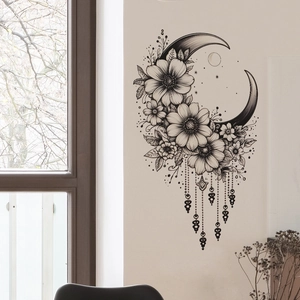 Artistic black and white sketch of floral moon wall decal in a cozy bedroom setting