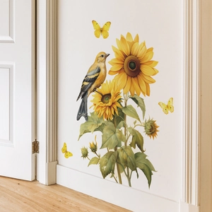 Détail de sticker mural montrant des tournesols, des oiseaux jaunes et papillons