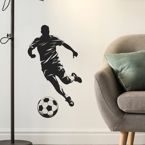 Sticker mural silhouette footballeur pour décoration salon au style sportif moderne