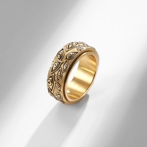 Goldener Edelstahl-Spinner-Ring mit Evil Eye Reliefs und mattem Vintage-Finish