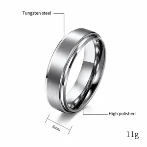 Detailed view of a 6mm silver tungsten steel ring with brushed finish and polished edges