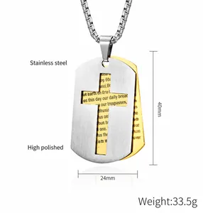 Macro shot of double-layer stainless steel cross dog tag with etched prayer text