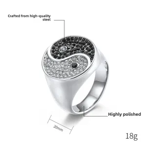 Macro detail of men's stainless steel Tai Chi ring with black and white zircon inlay