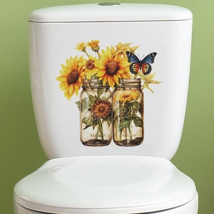 Watercolor sunflower and butterfly decals on a white toilet tank for bathroom decor