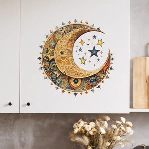 Stickers muraux mandala bohème lune et étoiles sur une porte de placard blanche