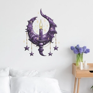 Detail of gothic purple crescent moon and candle wall sticker in a bedroom setting
