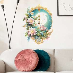 Romantic floral wall sticker with golden moon star frame above a grey sofa