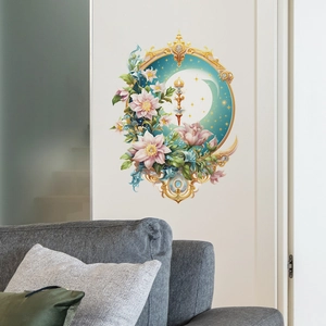 Detail of floral wall sticker with golden baroque frame and moon design over sofa
