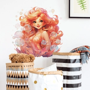 Cartoon mermaid princess wall sticker decorating a white wall in a cozy kids room
