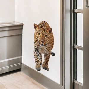 Detailed close-up of 3D lifelike leopard wall sticker with realistic fur texture on white wall