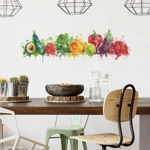 Artistic watercolor vegetable wall decals showing avocado and tomato in a bright dining room
