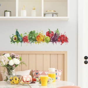 Artistic watercolor fruit and vegetable wall stickers displayed in a bright kitchen area