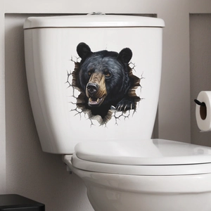 Detailed view of 3D cracked wall black bear sticker applied on a white toilet tank surface