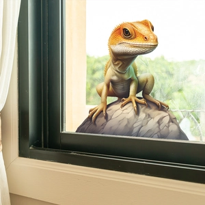 Detail of 3D lifelike bearded dragon window sticker with realistic stone on glass surface