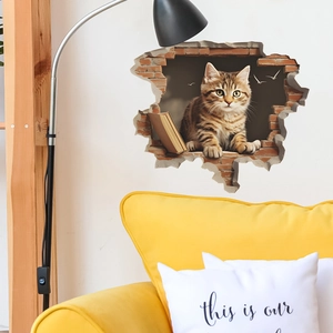 3D wall sticker featuring a cute cat peeping through a broken brick wall for home decor