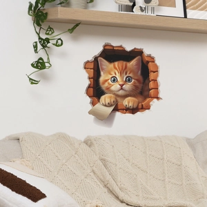 Detail of 3D orange tabby cat peeking through a broken brick wall decal on white home walls