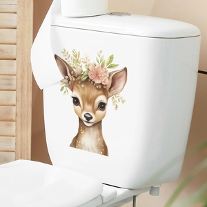 Detail of cute hand-drawn deer wall sticker with pink flowers on white toilet tank