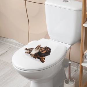 Detailed 3D cat and dachshund sticker application on a white toilet lid in a bathroom
