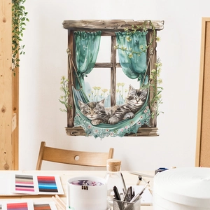 Detail of creative wall sticker showing cartoon cats sleeping in a hammock on window frame