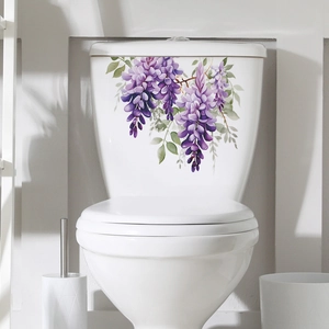 Detail showing purple wisteria floral stickers on white toilet tank for bathroom decor
