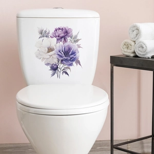 Detailed view of purple peony floral stickers applied on white ceramic toilet tank surface