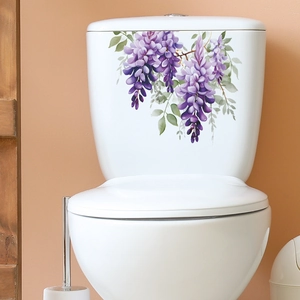 Detailed view of watercolor purple wisteria floral stickers on white ceramic toilet tank